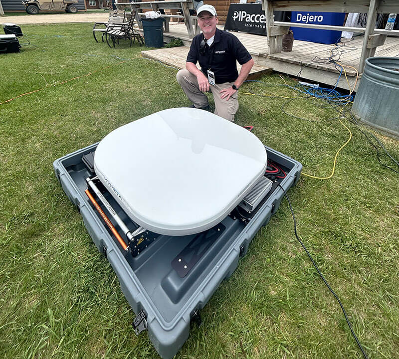 Michael Weaver with IP Access International, showcases the Kymeta antenna