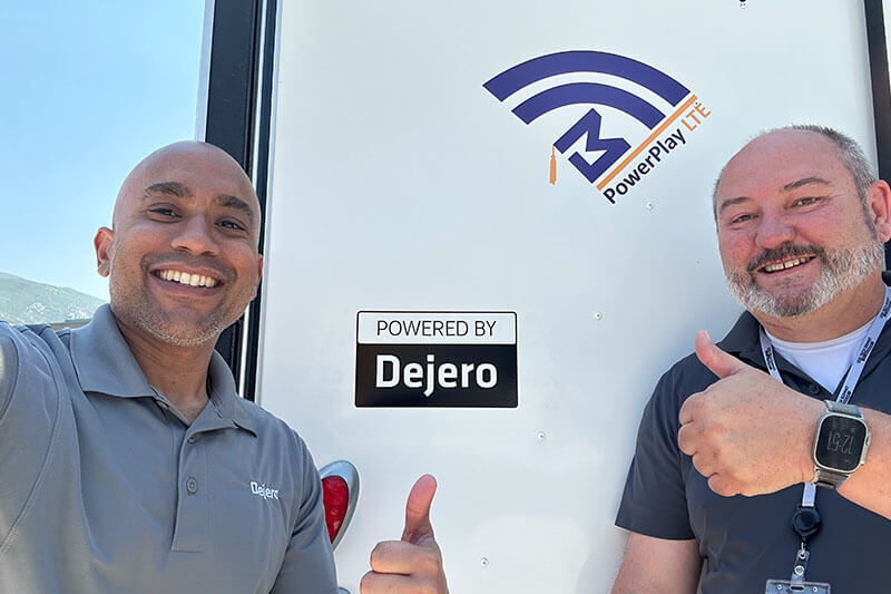 Kevin and Jason with the mobile connectivity solution giving thumbs up