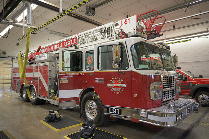 Graham Fire & Rescue vehicle in a garage