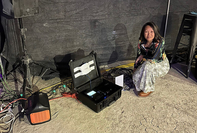 Mei beside an EnGo providing connectivity