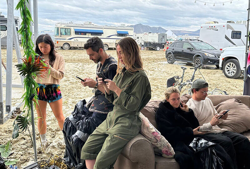 People relaxing on their phones